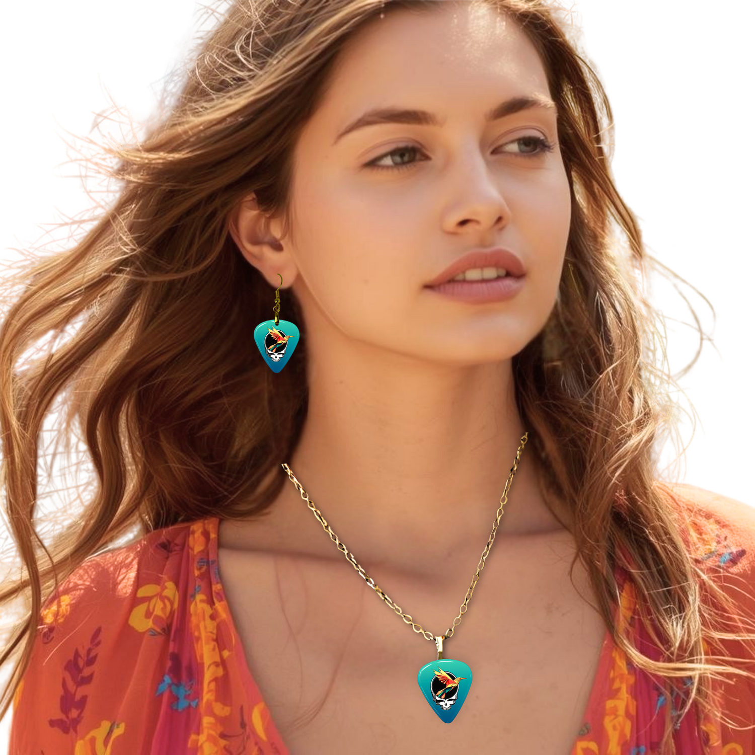 GRF – Ocean Flight jewelry set on model featuring teal glossy guitar pick design with the Golden Road Festival bird and Steal Your Face artwork.