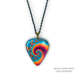 Close-up of Psychedelic Flight necklace  featuring the Golden Road Festival kaleidoscopic butterfly artwork.