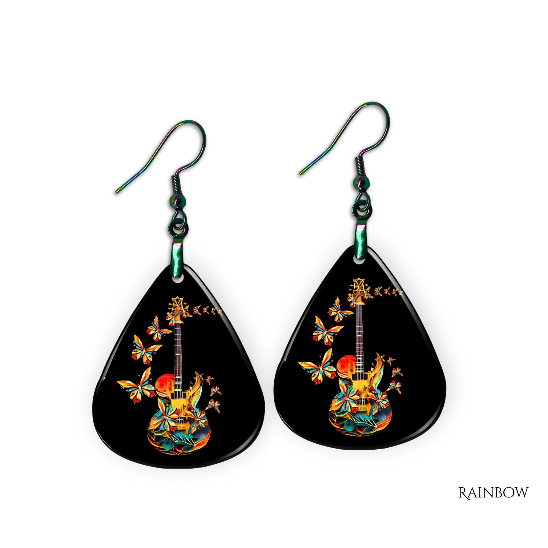 Close-up of handcrafted Stella’s Flight earrings showing vibrant butterfly-and-guitar artwork under a glossy epoxy finish.