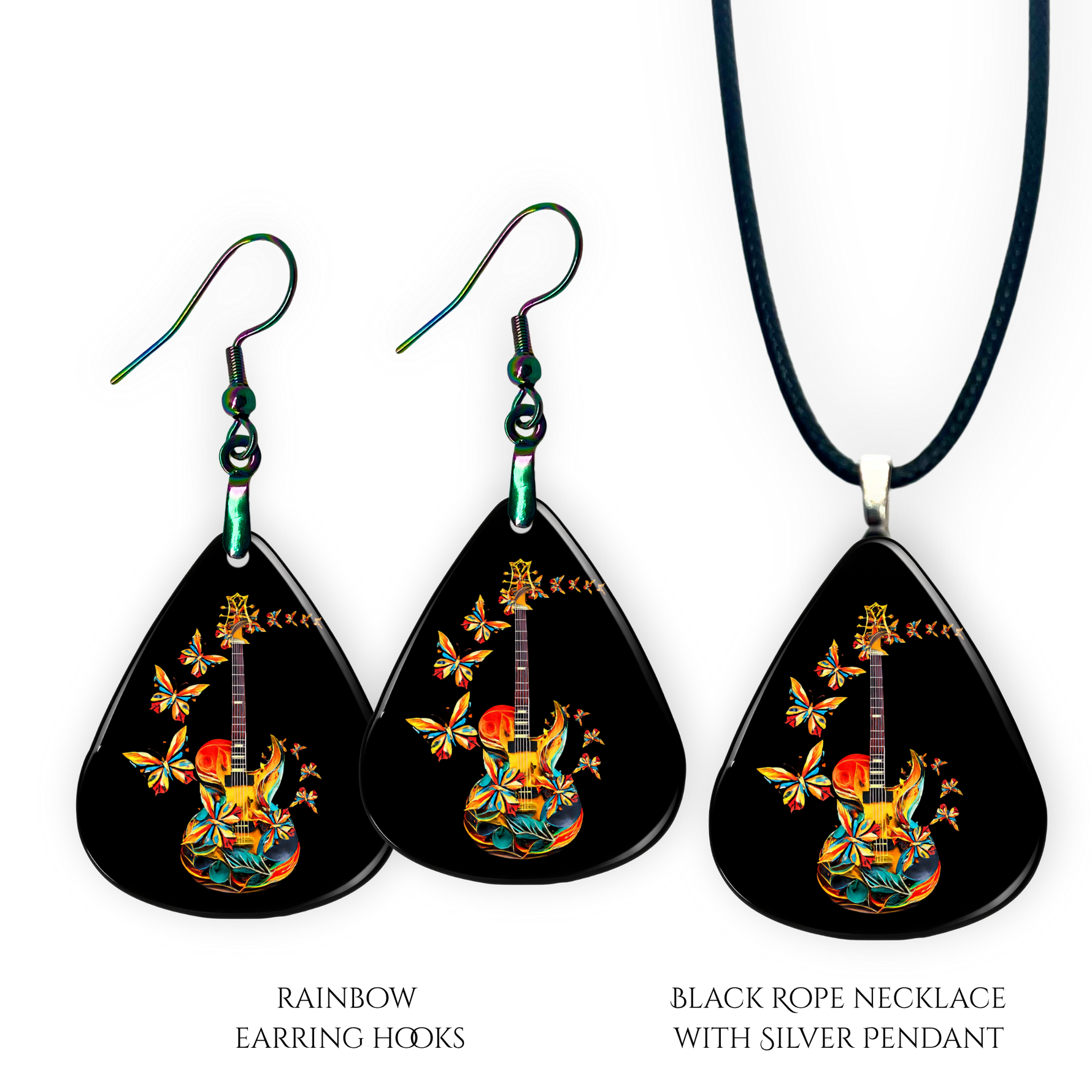 Close-up of handcrafted Stella’s Flight earrings and necklace pendant set showing vibrant Golden Road Festival butterfly-and-guitar artwork under a glossy epoxy finish.