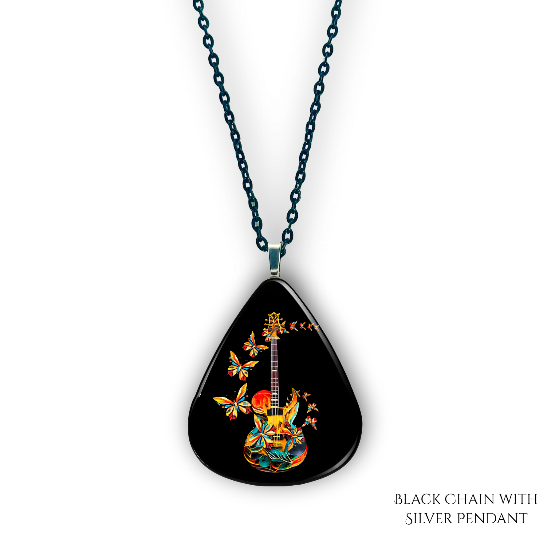 Close-up of handcrafted GRF Stella’s Flight necklace showing the vibrant Golden Road Festival butterfly-and-guitar artwork under a glossy epoxy finish.